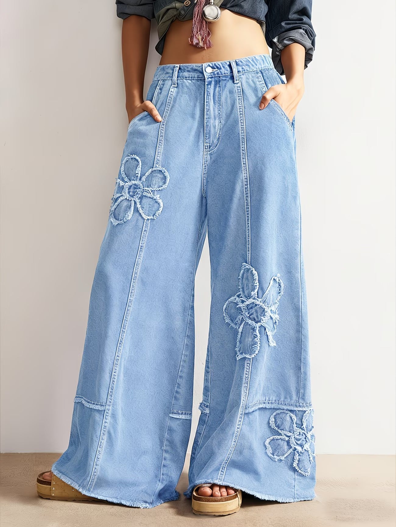 Dam vida byxor med blomaccenter